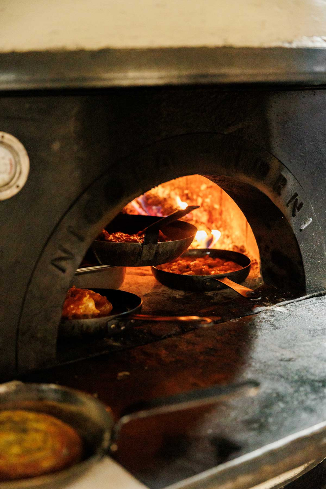 Its entirely wood-fired kitchen revives Greek culinary heritage (Photo: Pharaoh)
