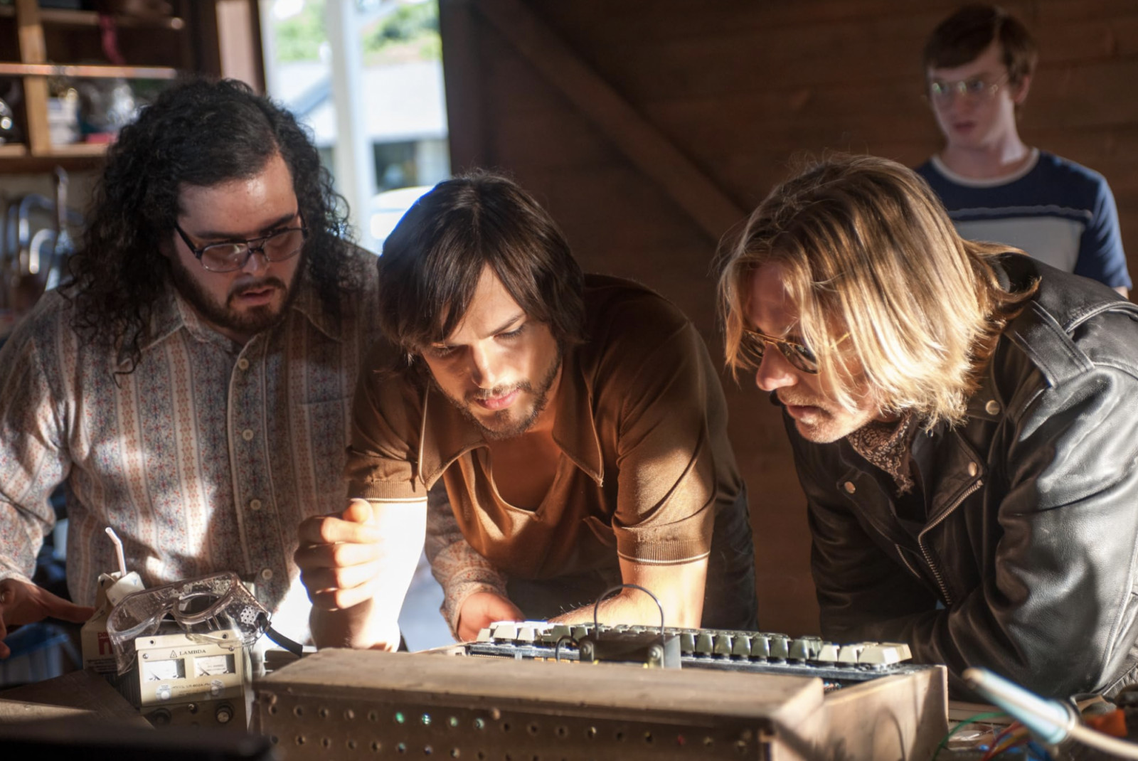 Ashton Kutcher, Ron Eldard, and Josh Gad in Jobs (Photo: IMDB)