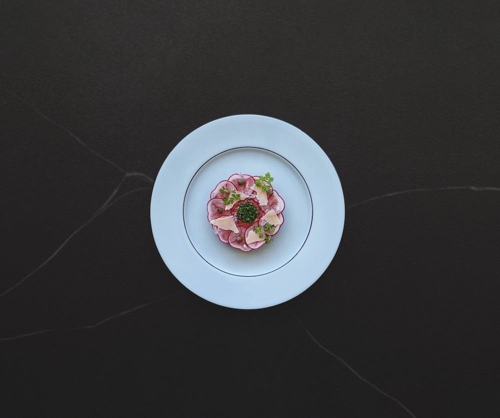 Beef tartare with parmigiano-reggiano at Prada Caffè (Photo: Prada Caffè)