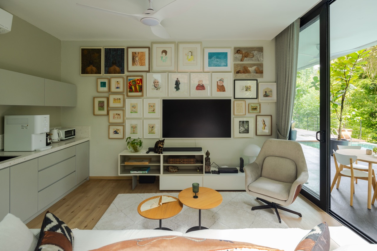 A carefully composed gallery wall featured everything from contemporary portraits to vintage photography
