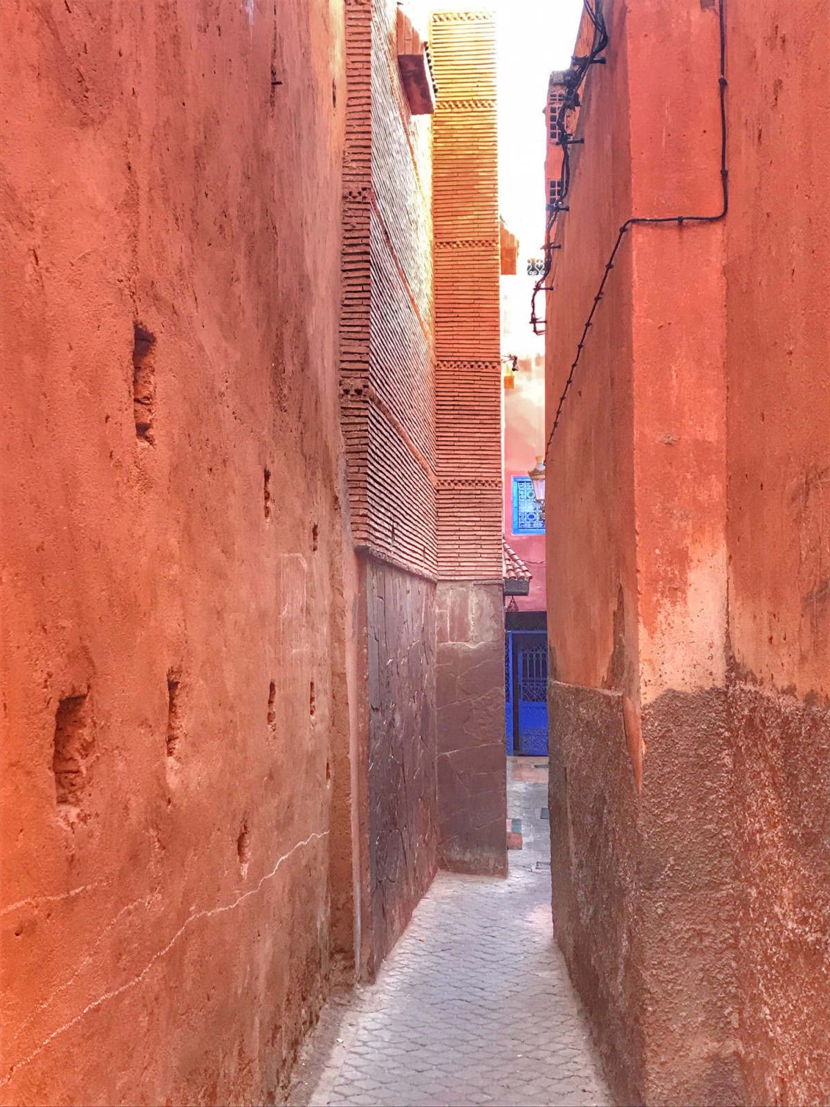 Get lost in alleyways surrounded by buildings the colour of the sunset. (Photo: Maggie Adan)