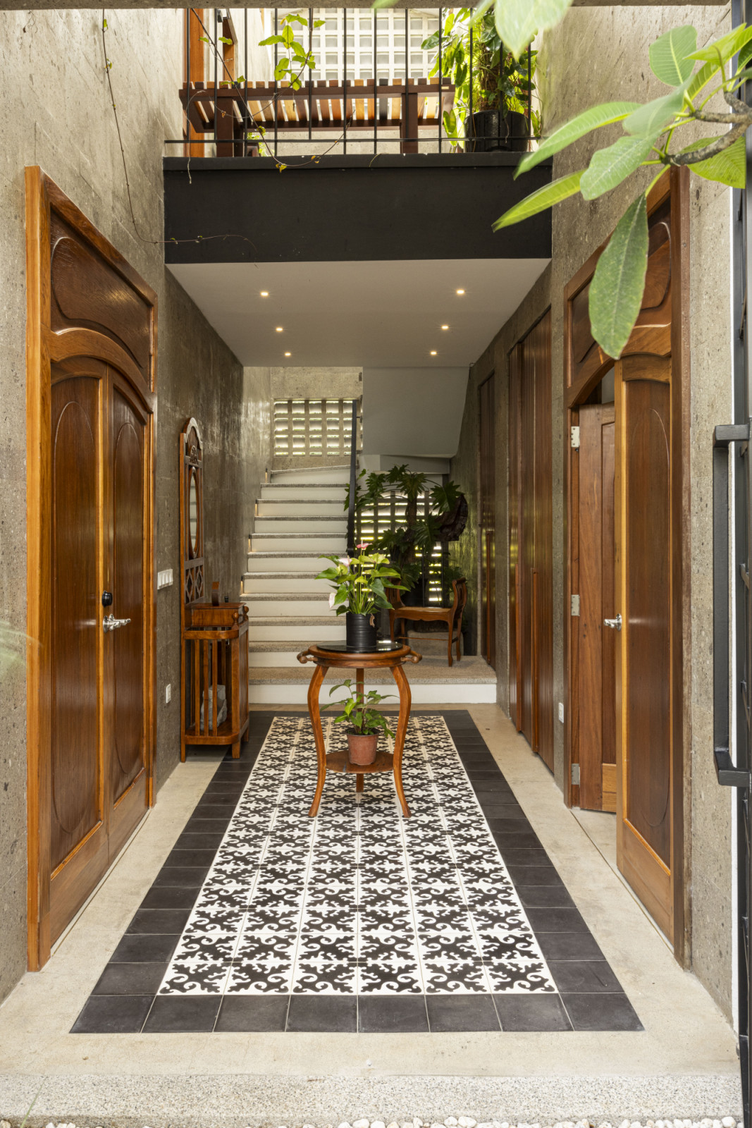The entryway a verdant Laguna, Philippines family home designed by architect Miko Delos Reyes