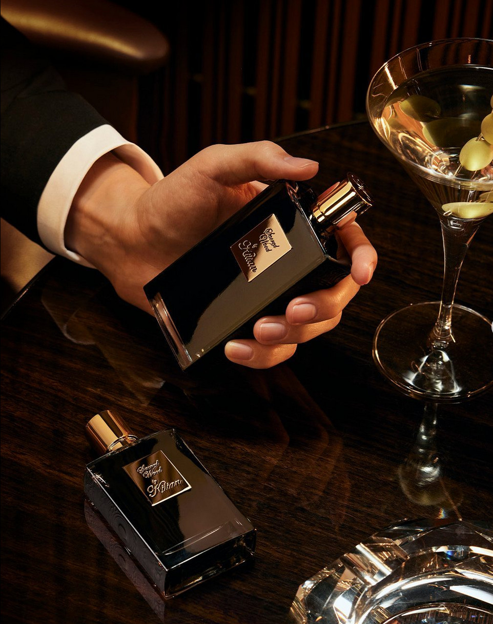 Woody perfumes, such as Kilian Paris Sacred Wood, offer sophisticated warmth and grounding comfort, making them the perfect olfactory companions for the cooler months ahead. (Photo: @kilianparis / Instagram)