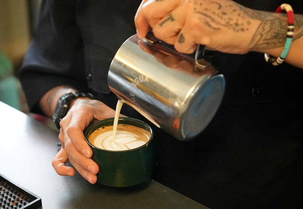 AUSTIN, TEXAS - SEPTEMBER 12: Barista Mateo Ariza works at Mercado Sin Nombre in Austin, Friday, Sept. 12, 2025. (Jay Janner/The Austin American-Statesman via Getty Images)