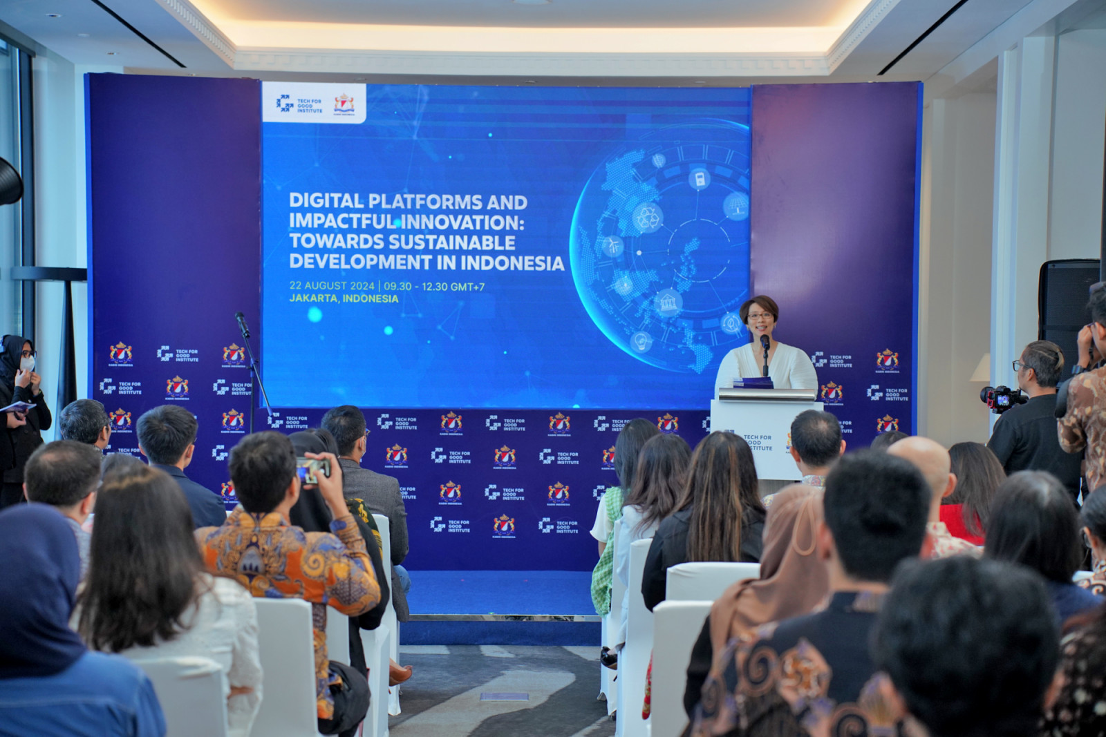 Ming Tan speaking at a conference in Jakarta in 2024