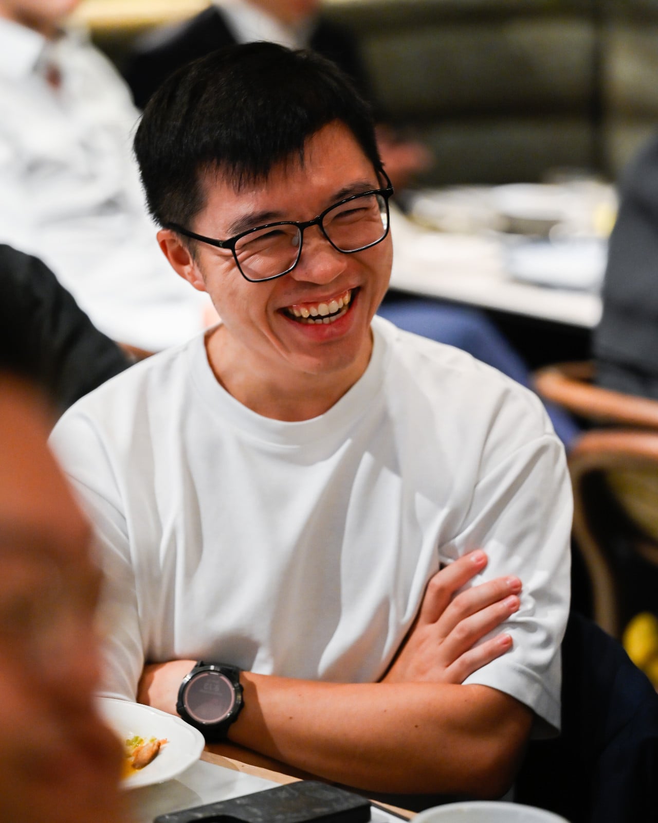 Steven Lam, co-founder of GoGoX, laughs while networking with fellow attendees (Photo: Tatler Hong Kong)