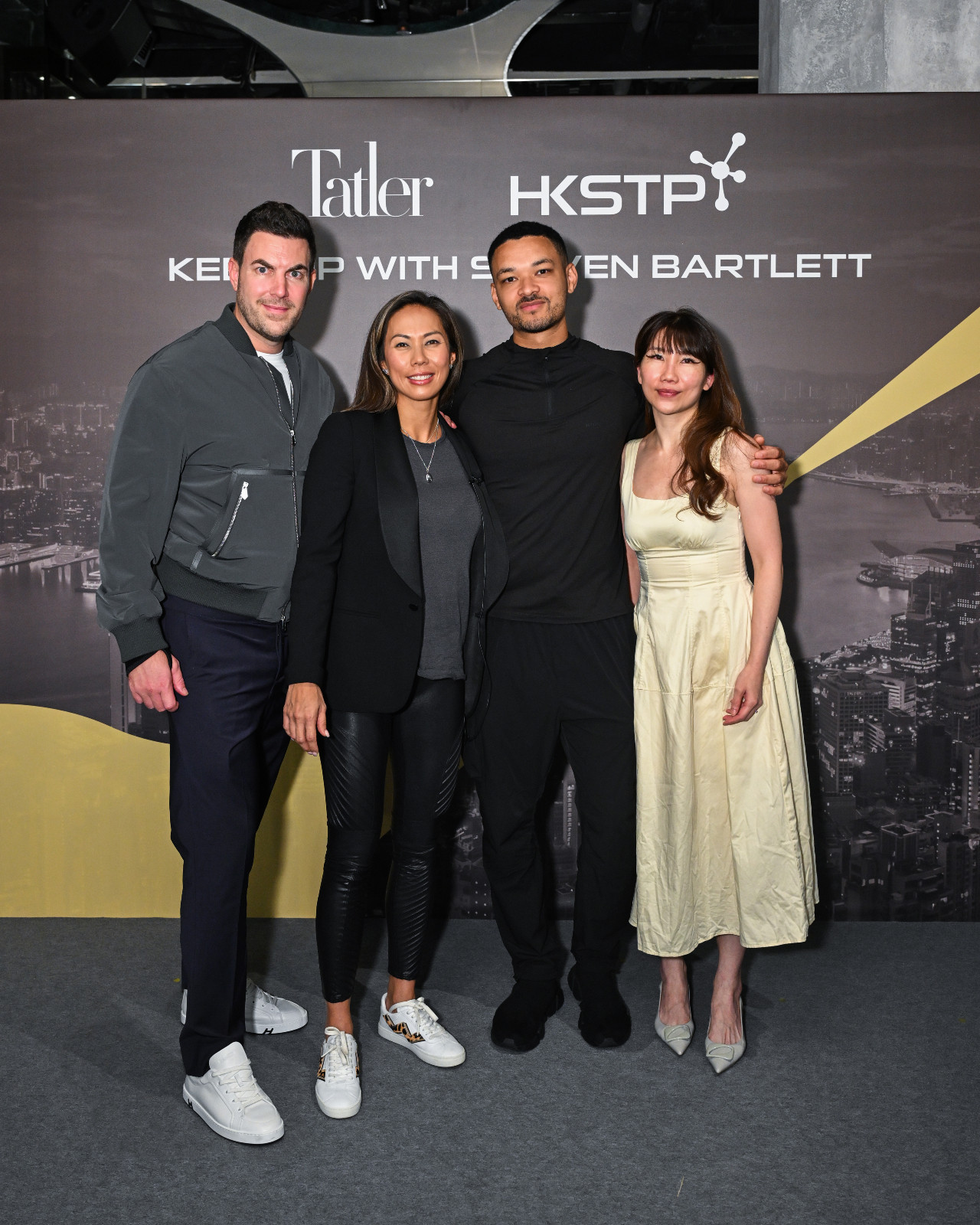 Michel Lamunière, CEO of Tatler Asia, Lamunière, Bartlett and Hilda Chan, chief marketing officer of HKSTP, pose for a group photo on stage (Photo: Tatler Hong Kong)