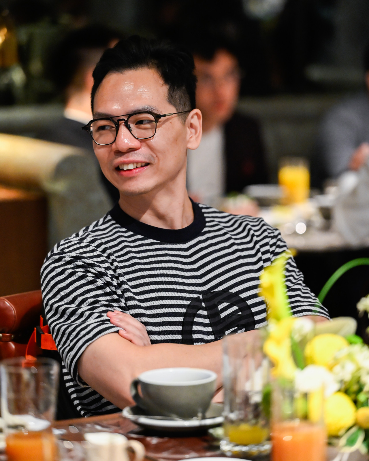 Gary Ng, co-founder and CEO of ViAct, listens to Bartlett’s insights (Photo: Tatler Hong Kong)