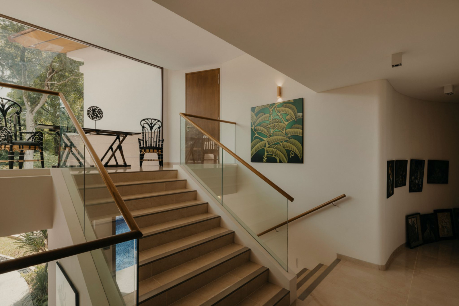 The split-level layout imparts a sense of intimacy in scale