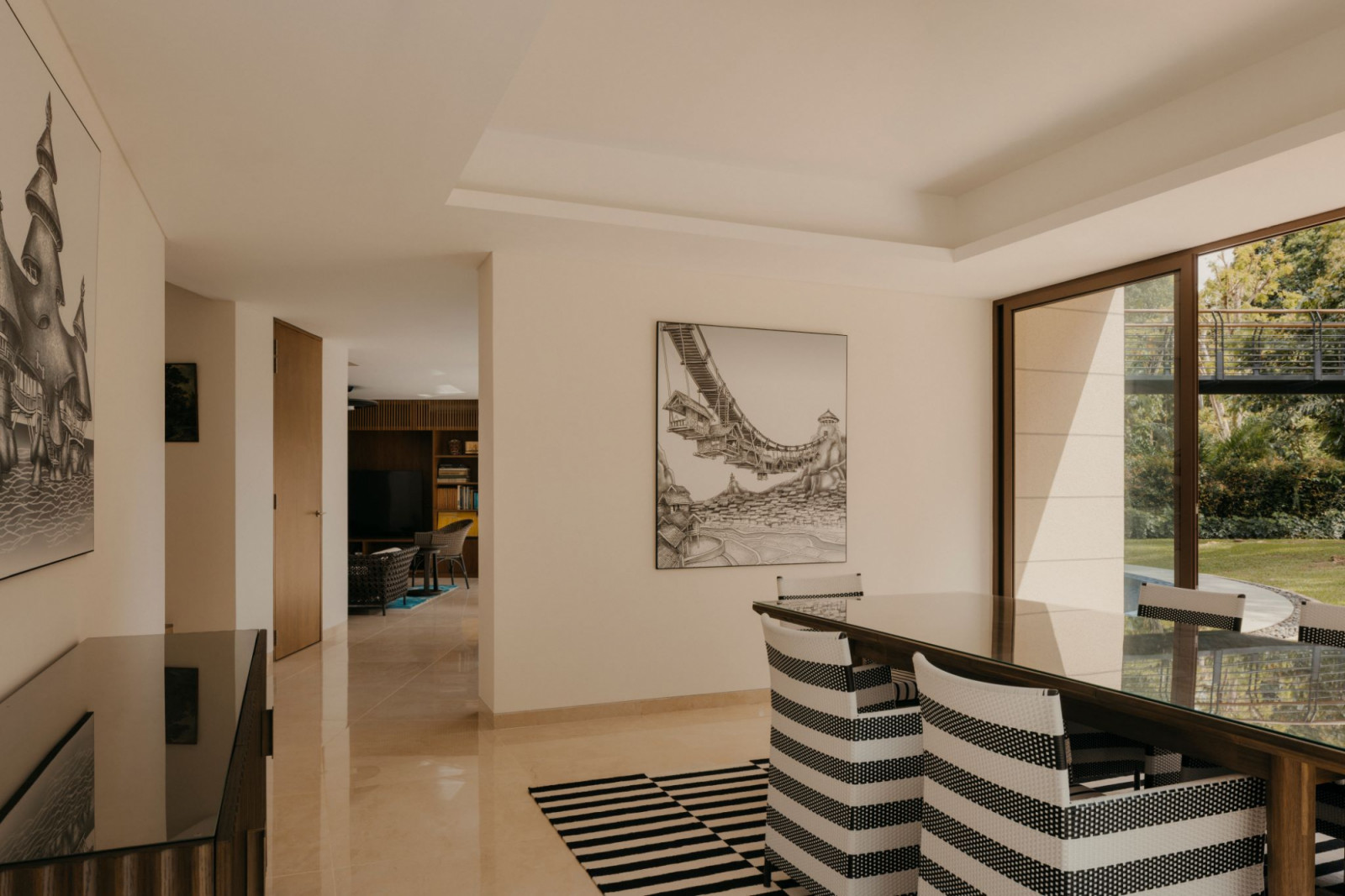 Artwork and graphic finish of the furniture lend colours to the interior