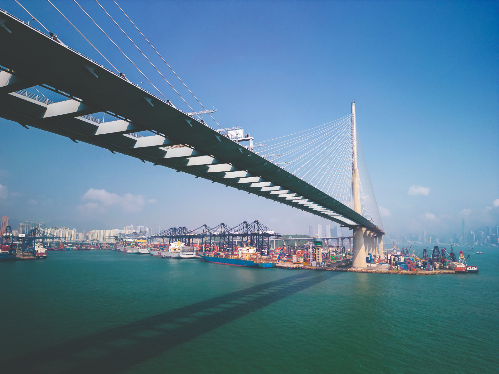Aerial view of suspension bridge in a industrial area in Hong Kong