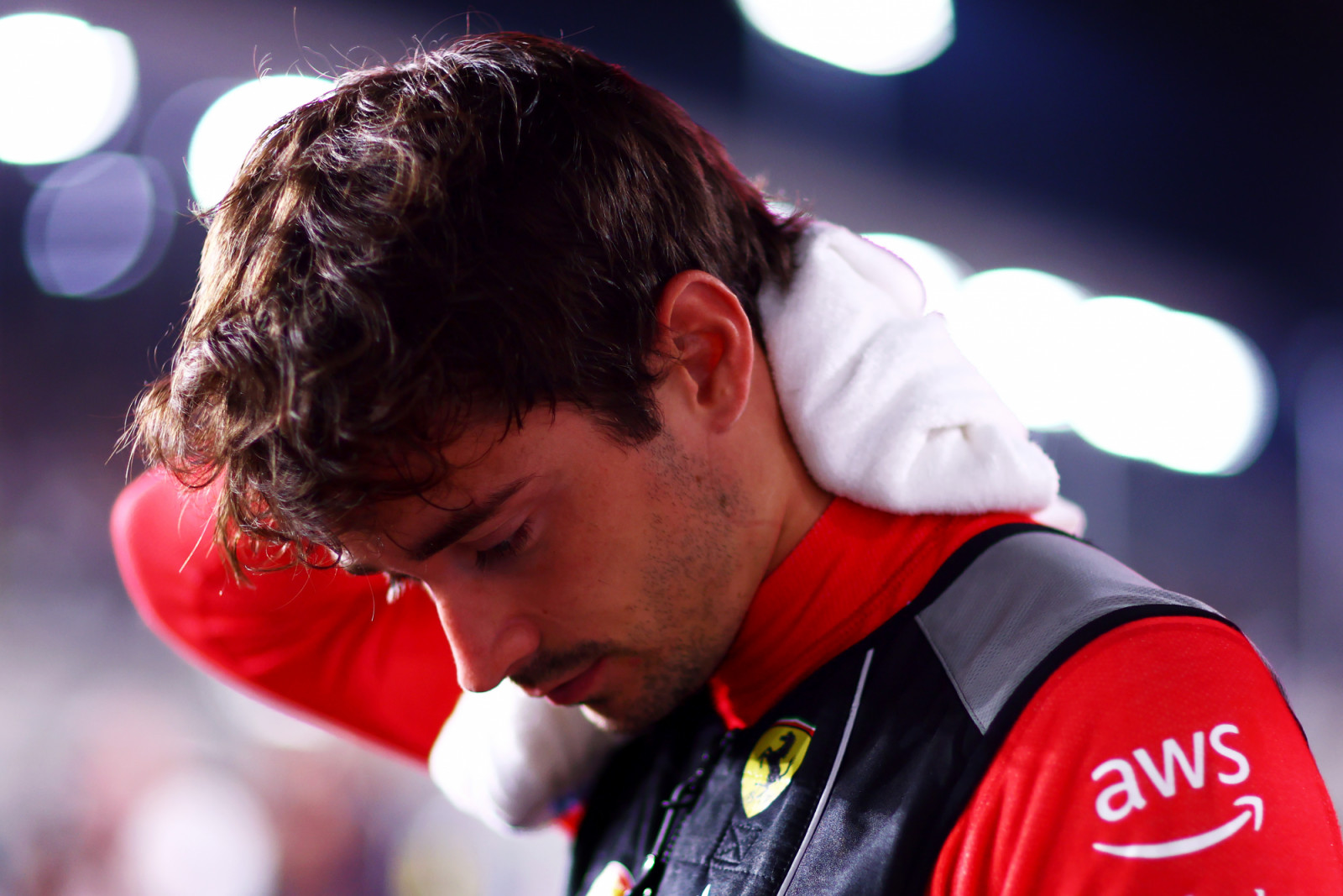 LUSAIL CITY, QATAR - OCTOBER 08: Charles Leclerc of Monaco and Ferrari prepares on the grid before the F1 Grand Prix of Qatar at Lusail International Circuit on October 08, 2023 in Lusail City, Qatar. (Photo by Dan Istitene - Formula 1/Formula 1 via Getty Images)