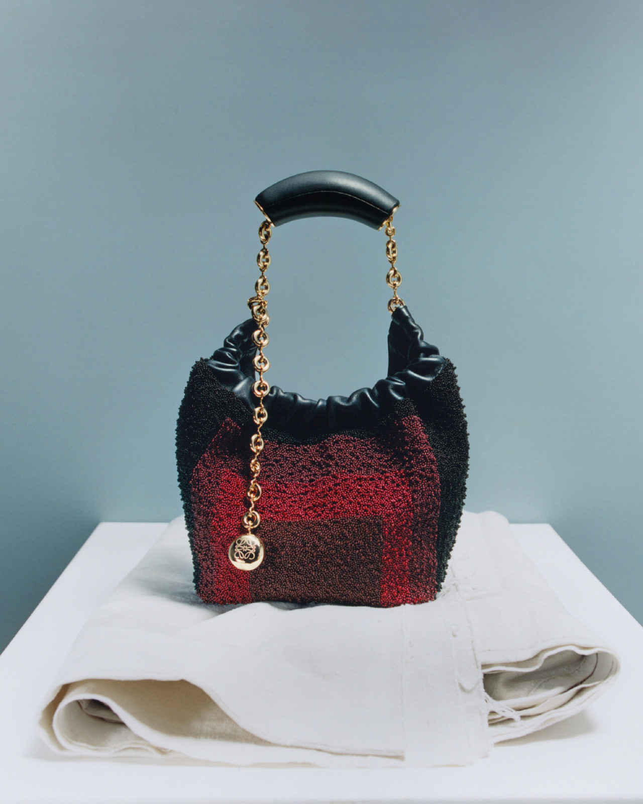 A sculptural statement where art meets elegance with the Loewe x Albers Squeeze Mini (Photo: Courtesy of Loewe)