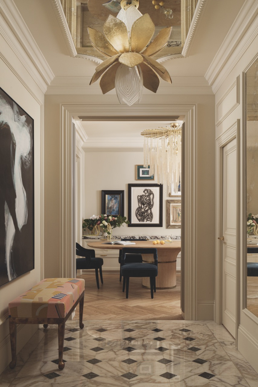 Rhe reconfigured entrance hallway sets the tone for the apartment’s elegant transformation
