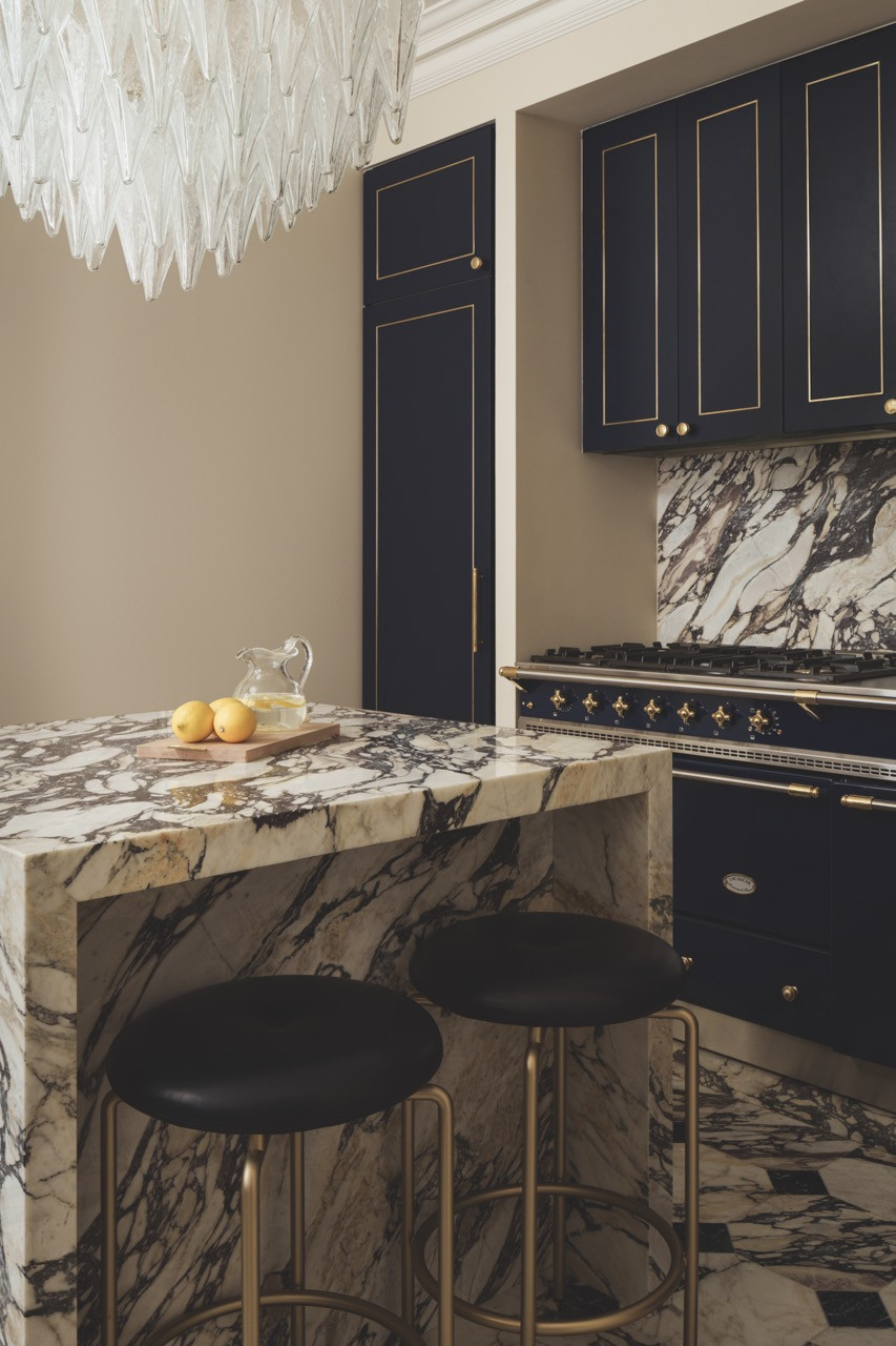 Rich materials and thoughtful details create a space that serves the practical needs of the family