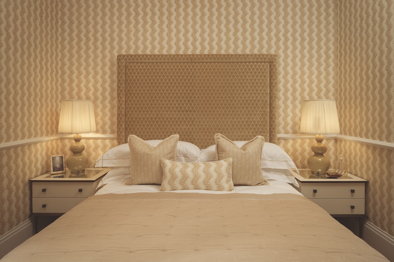 The bedrooms continue the design narrative of rich textures and personal touches