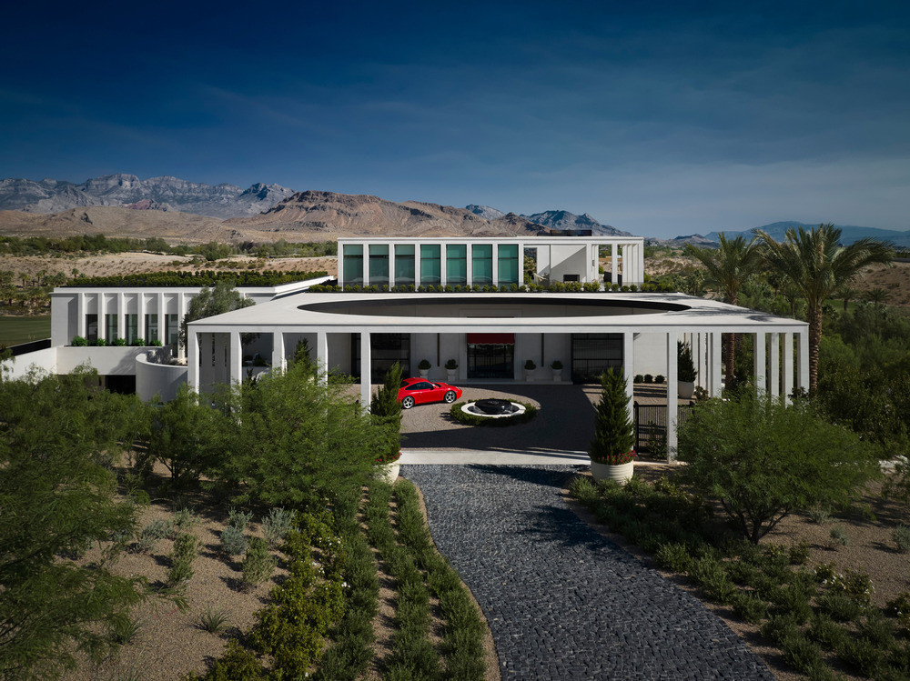 Tombolo perches like a crown upon a natural rise in the Nevada desert with gardens and outdoor terraces that extend toward the dune horizons