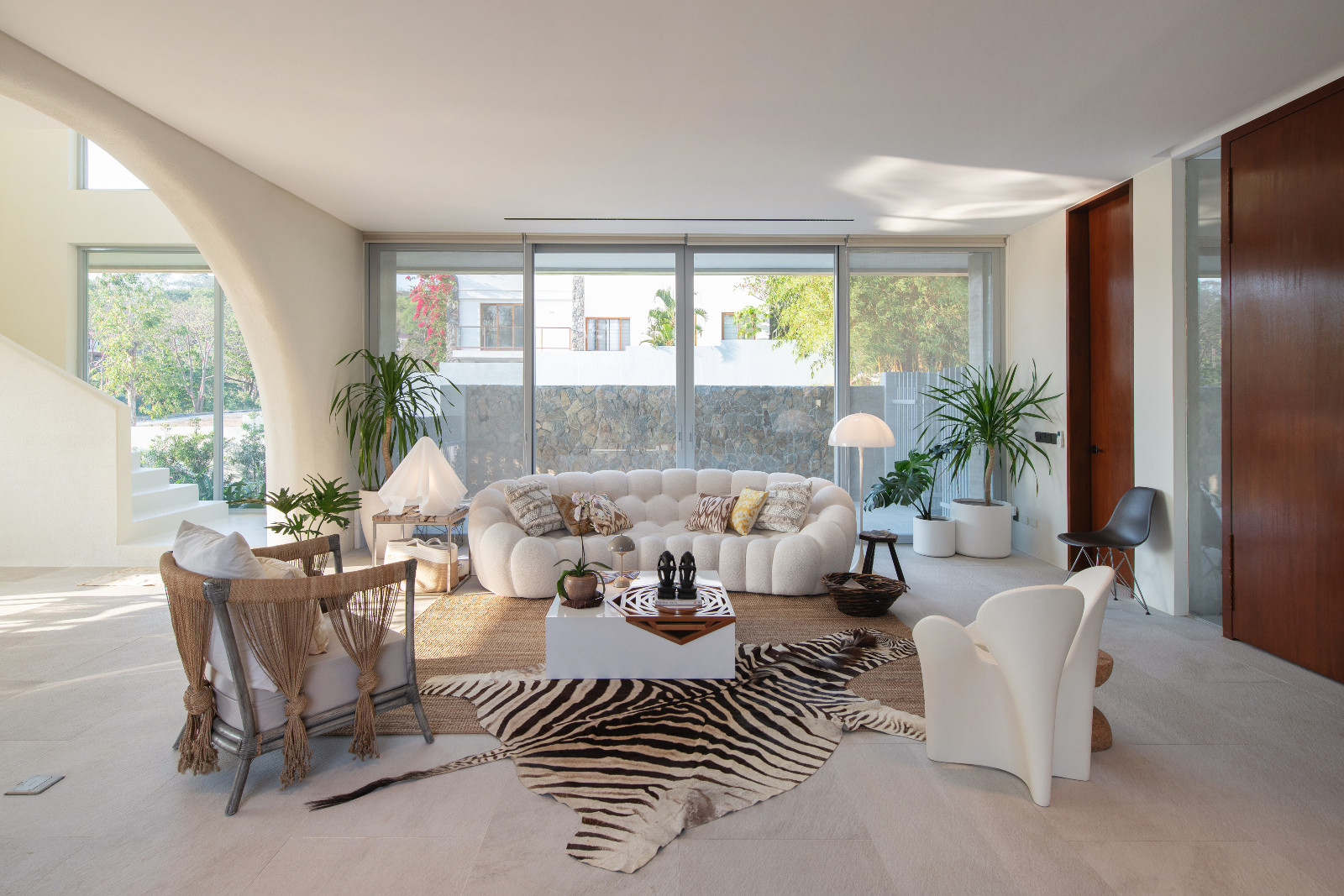 The living room on the ground floor of the Cove House by Brioarc Design Studio, located in Nasugbu, Batangas