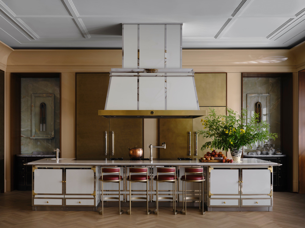 The blush-hued kitchen with a 13-foot La Cornue range