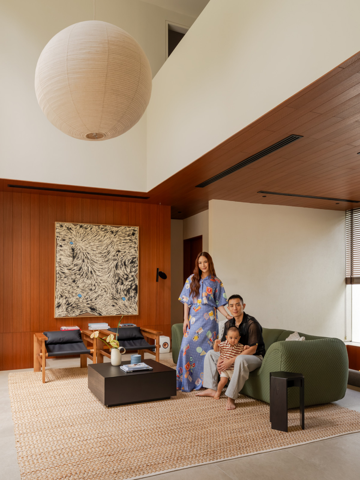 Jane Chuck, Han Pin and their baby boy August in their Seputeh abode inspired by mid-century designs in Los Angeles