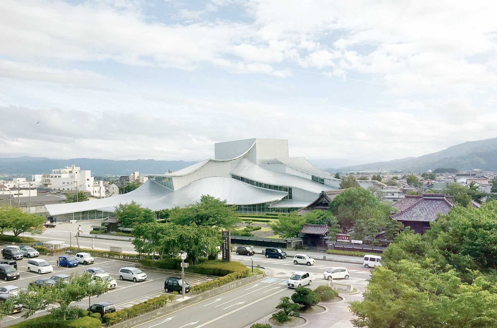 Tsuruoka City Cultural Hall on Japan’s northwestern coast is a single-storey hub with a vineyard-style concert hall and sweeping canopies (Photo: SANAA)