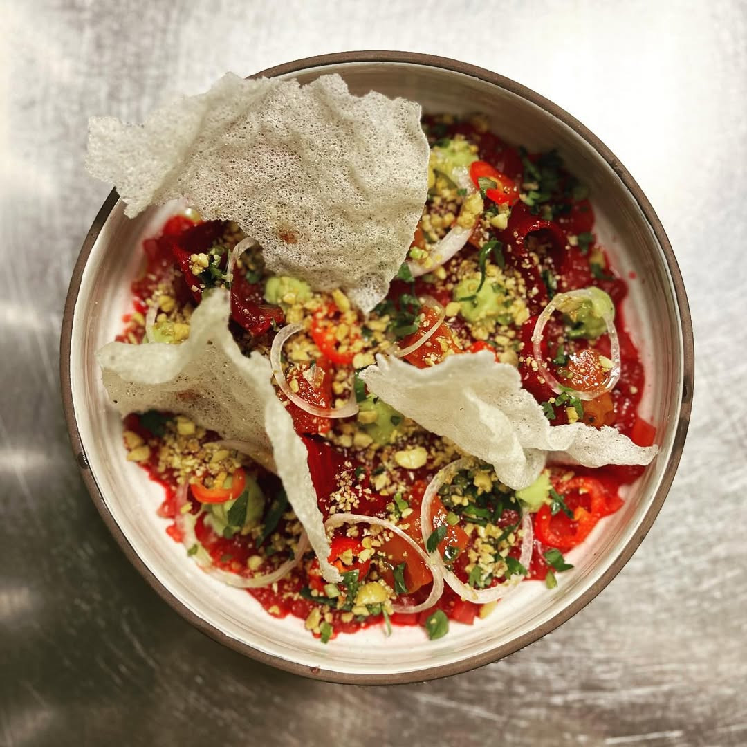 Award-winning chef Kevin Tien nixed the blood in favour of bluefin tuna tartare, beet ponzu, crushed peanuts, herbs, rice crisp and roasted flame badger beets. (Photo: Instagram/@chefkevintien)