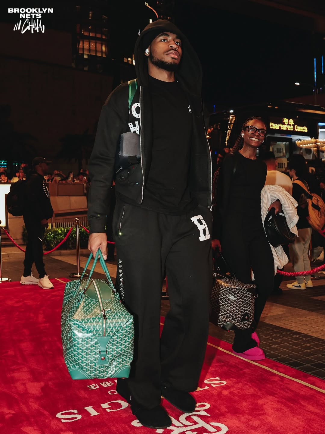 Cam Thomas carries a green Goyard bowling bag. (Photo: Brooklyn Nets / Instagram)