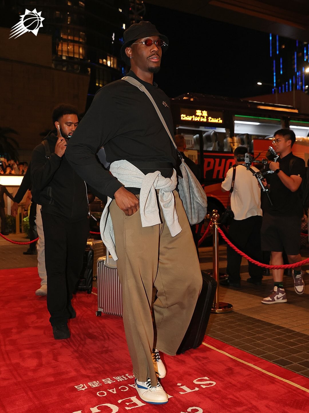 Nigel Hayes looks cozy in athleisure and a Louis Vuitton crossbody.  (Photo: Suns / Instagram)
