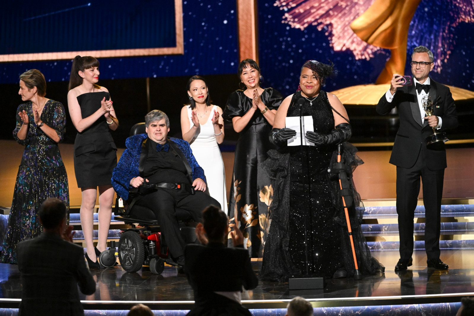 The team from "Patrice: The Movie" accepts the Exceptional Merit in Documentary Filmmaking Emmy during night two of the Television Academy's 2025 Creative Arts Emmy Awards on Sunday, Sept. 7, 2025 at the Peacock Theater in Los Angeles (Photo by Phil McCarten/Invision for the Television Academy/AP Content Services)