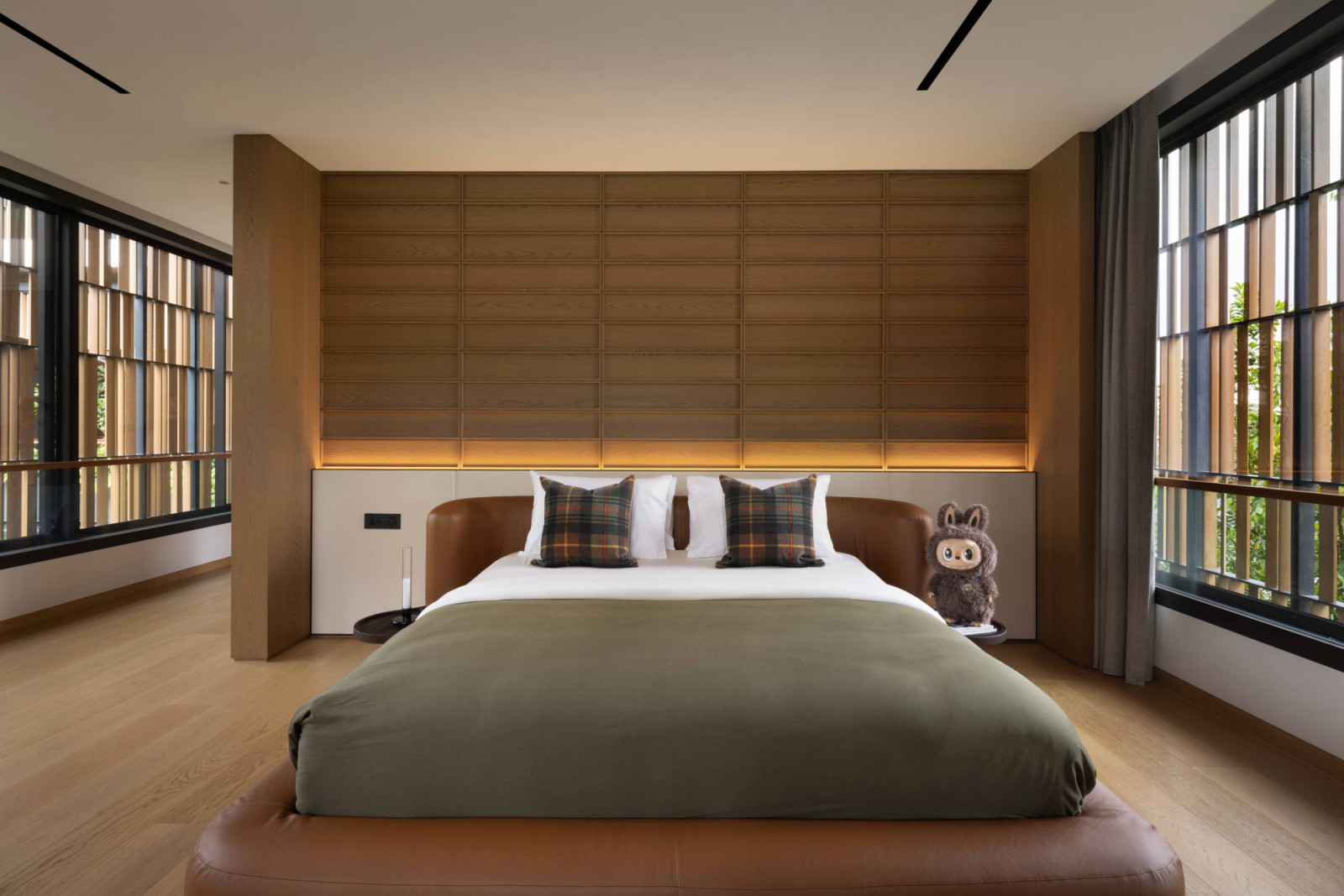 One of the children’s bedrooms features a Baxter Clara bed that evokes a modern twist of a Japanese room
