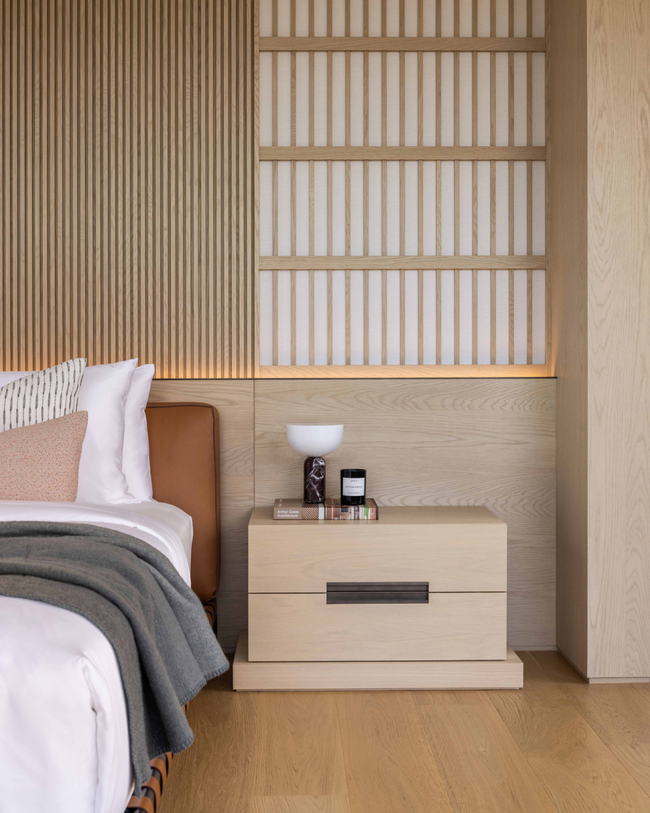 This bedside vignette reveals Japanese-influenced detailing expressed through its simplicity and material selection