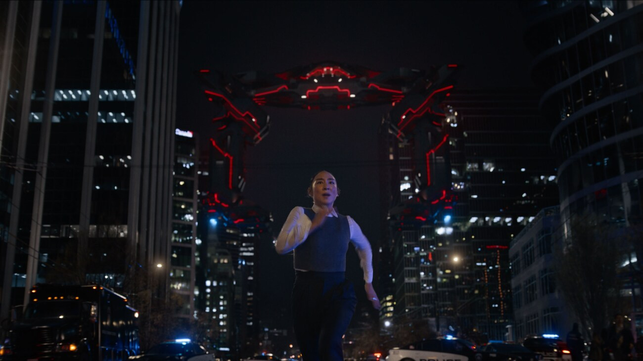 Greta Lee portrays Eve in 'Tron: Ares', whose unique bond with Ares blurs the line between human emotion and digital code