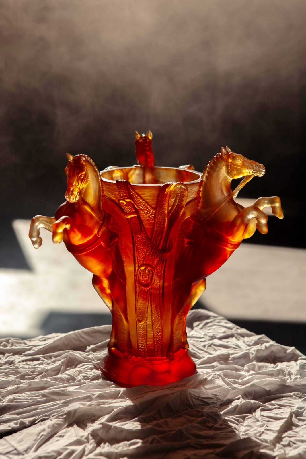 A subtle blend of three shades of amber lends the collection its warm, radiant crystal colour