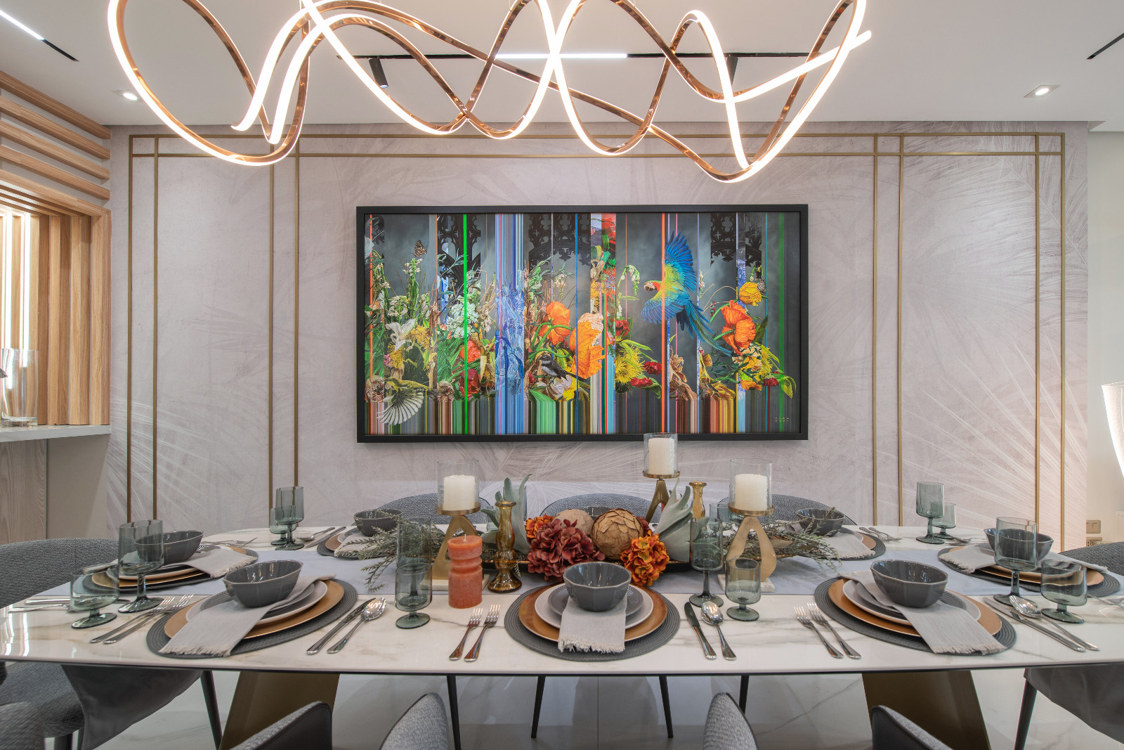 The dining room of a Makati home designed by architect Freddy Bautista, alongside interior designers Loubs and Ricia Gardiola, featuring an expansive collection by Filipino artists