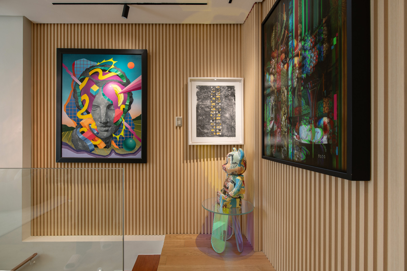 The family room of a Makati home designed by architect Freddy Bautista, alongside interior designers Loubs and Ricia Gardiola, featuring an expansive collection by Filipino artists