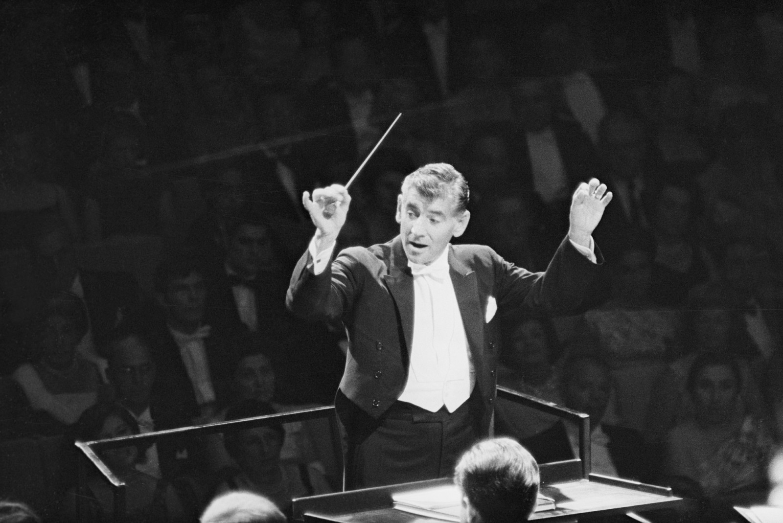 New York Philharmonic conductor Leonard Bernstein conducts at the opening of the philharmonic hall at Lincoln Center.