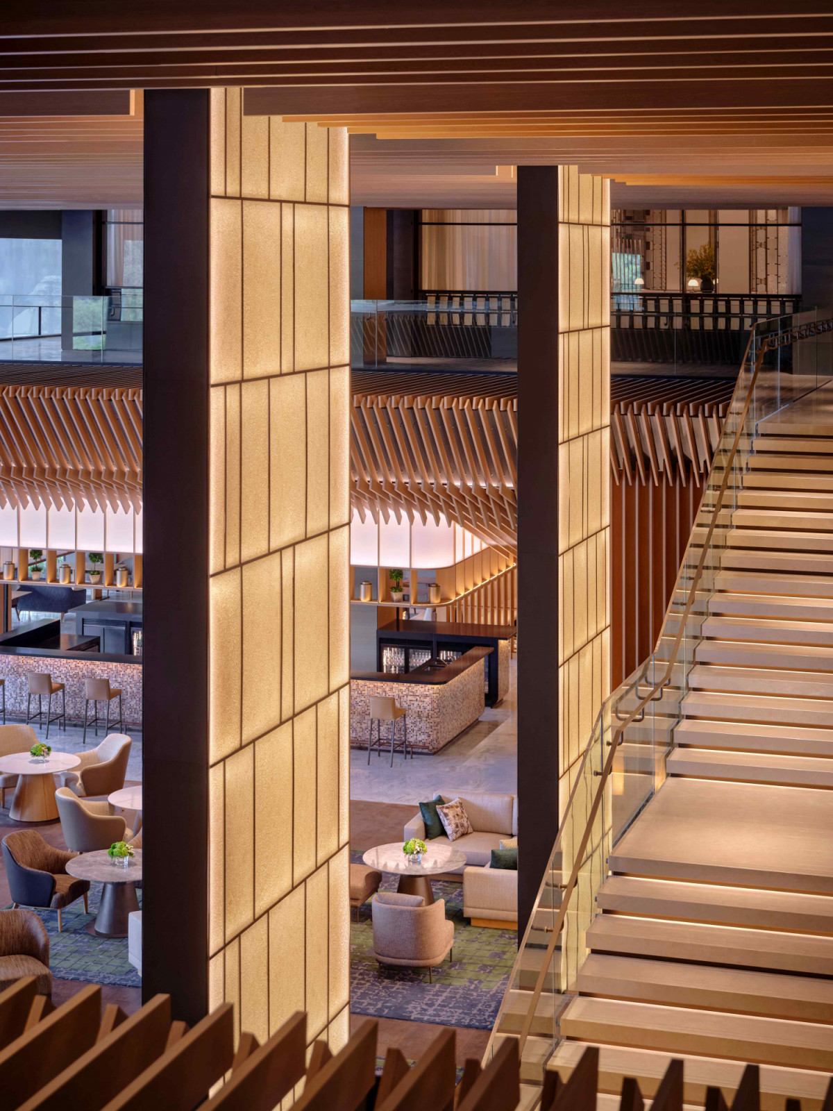 Rice paper screens on wide columns, imported from Japan, add warmth and a tropical feel