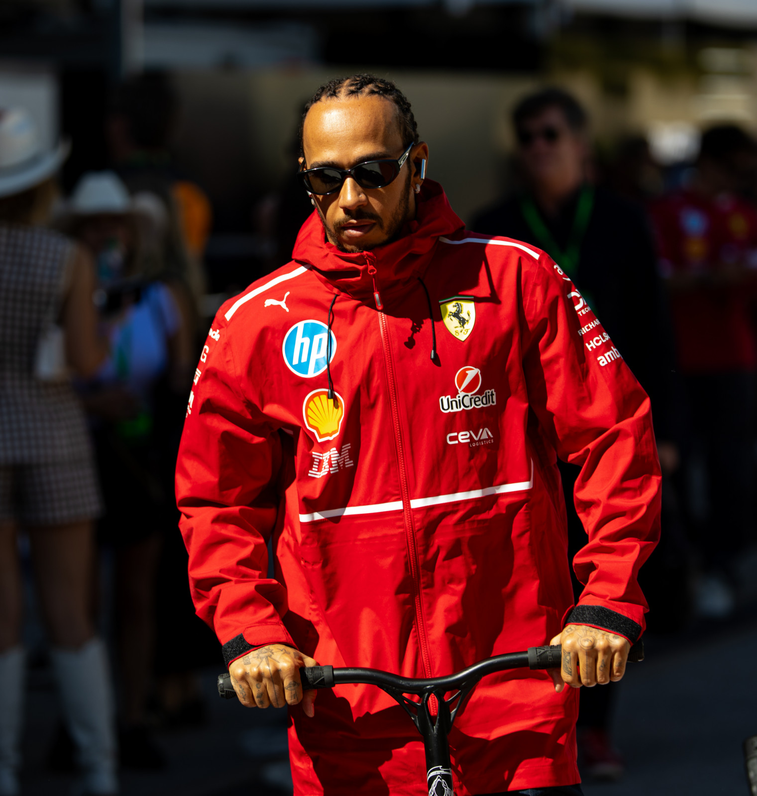 AUSTIN, TEXAS - OCTOBER 19: Lewis Hamilton of Great Britain and Ferrari scoots in the paddock during the F1 Grand Prix of United States at Circuit of The Americas on October 19, 2025 in Austin, Texas. (Photo by Kym Illman/Getty Images)