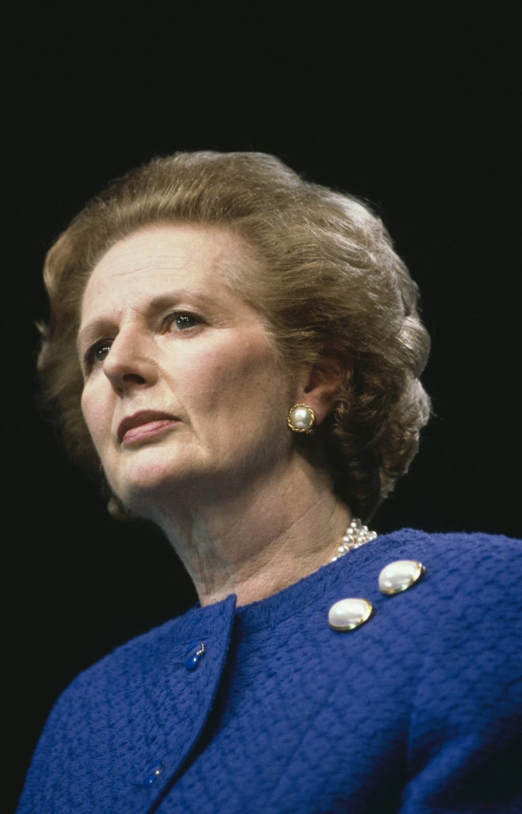 Close-up of British Prime Minister Margaret Thatcher (1925 - 2013) (center) during an event on her UK general election campaign, Great Britain, May or June 1987. (Photo by Derek Hudson/Getty Images)