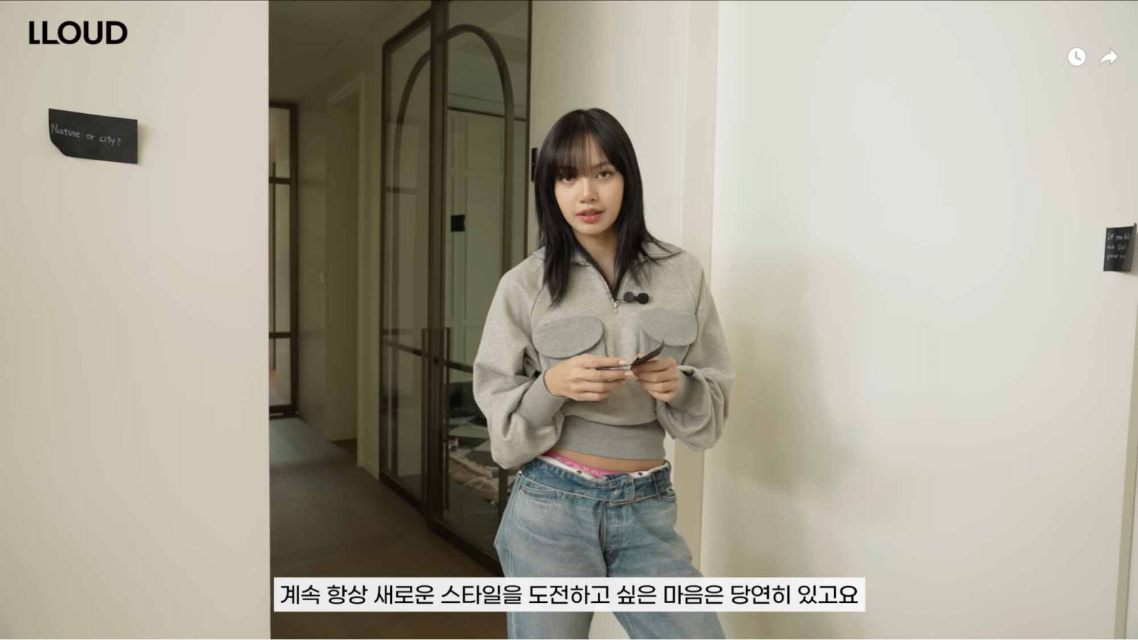 Lisa in her Parisian-style apartment (Photo: Youtube / LLOUD Official)