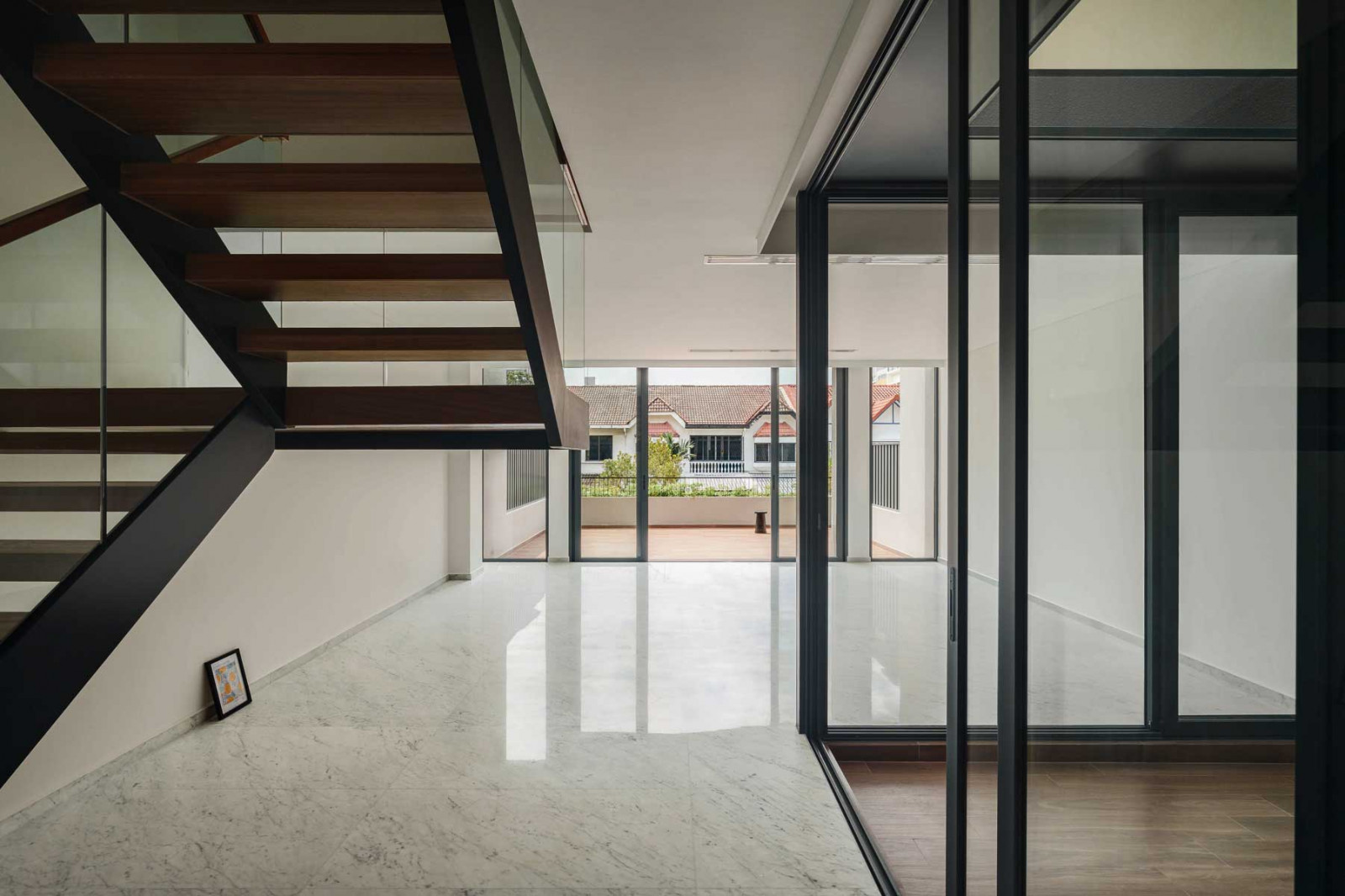 The empty interior of the terrace house’s second level