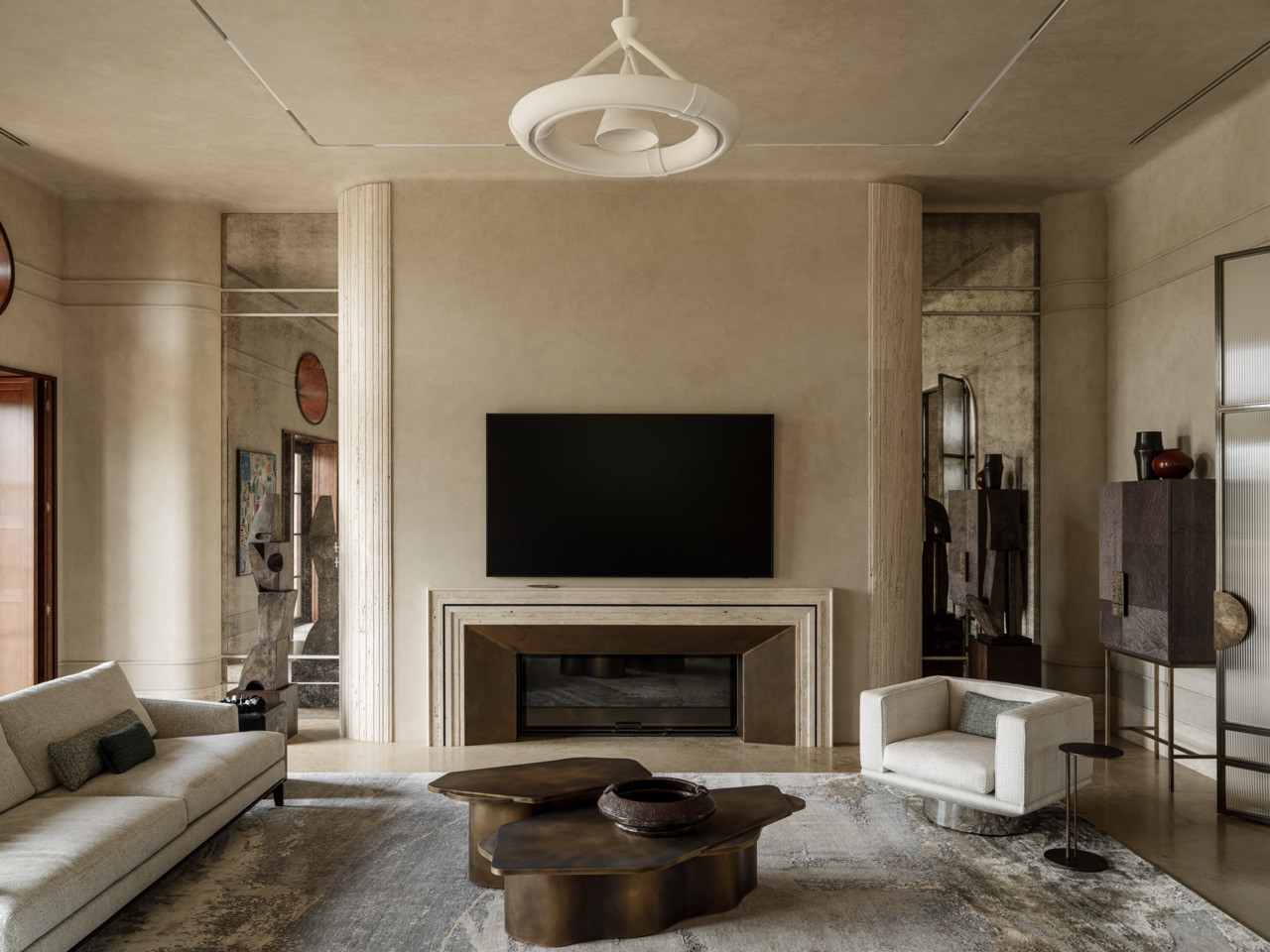 Full view of the living room showing the strong axial layout with fluted travertine columns on either side