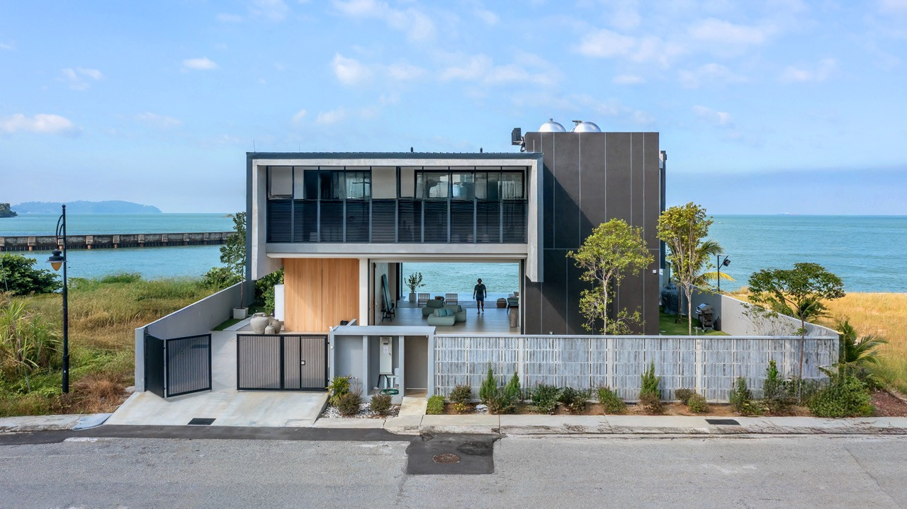 The Port Dickson house by DCA+ presents a confident architectural statement from the street approach