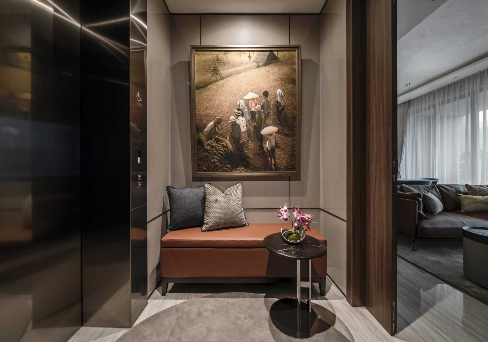 A plush seat in rich ochre lends cosiness to the entryway