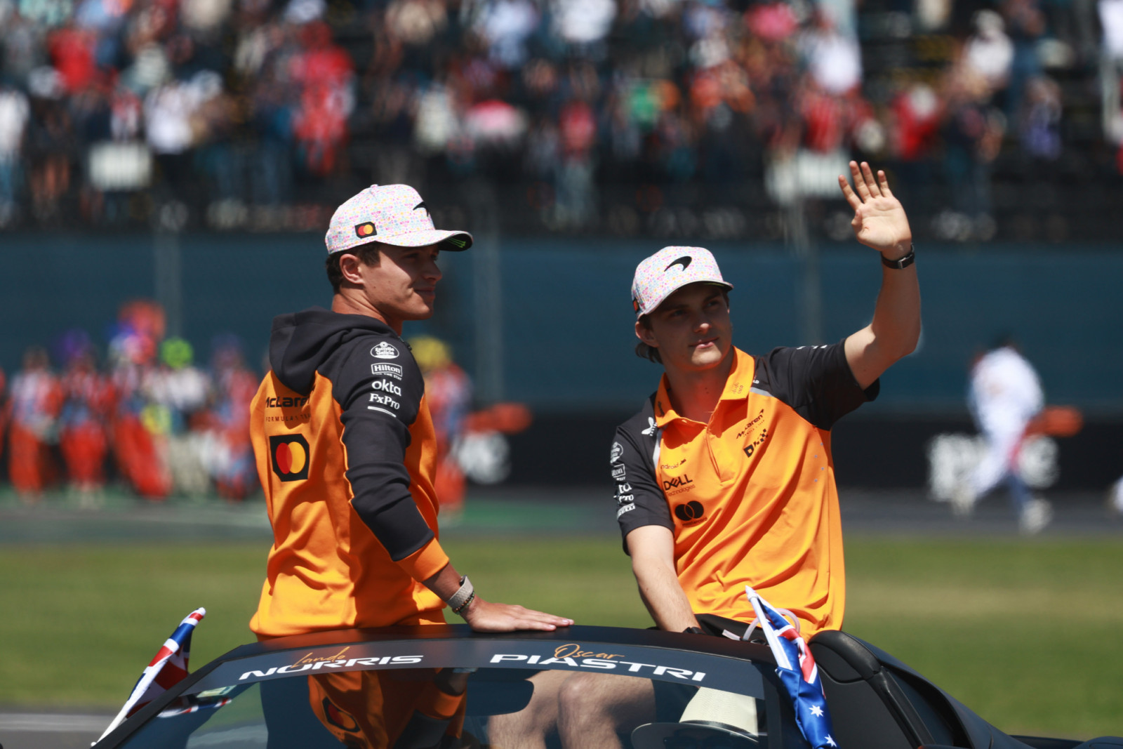 MEXICO CITY, MEXICO - OCTOBER 26: Lando Norris and Oscar Piastri of McLaren take part in the drivers parade during the F1 Grand Prix of Mexico, at Autodromo Hermanos Rodriguez, in Mexico City, Mexico on October 26, 2025. (Photo by Daniel Cardenas/Anadolu via Getty Images)
