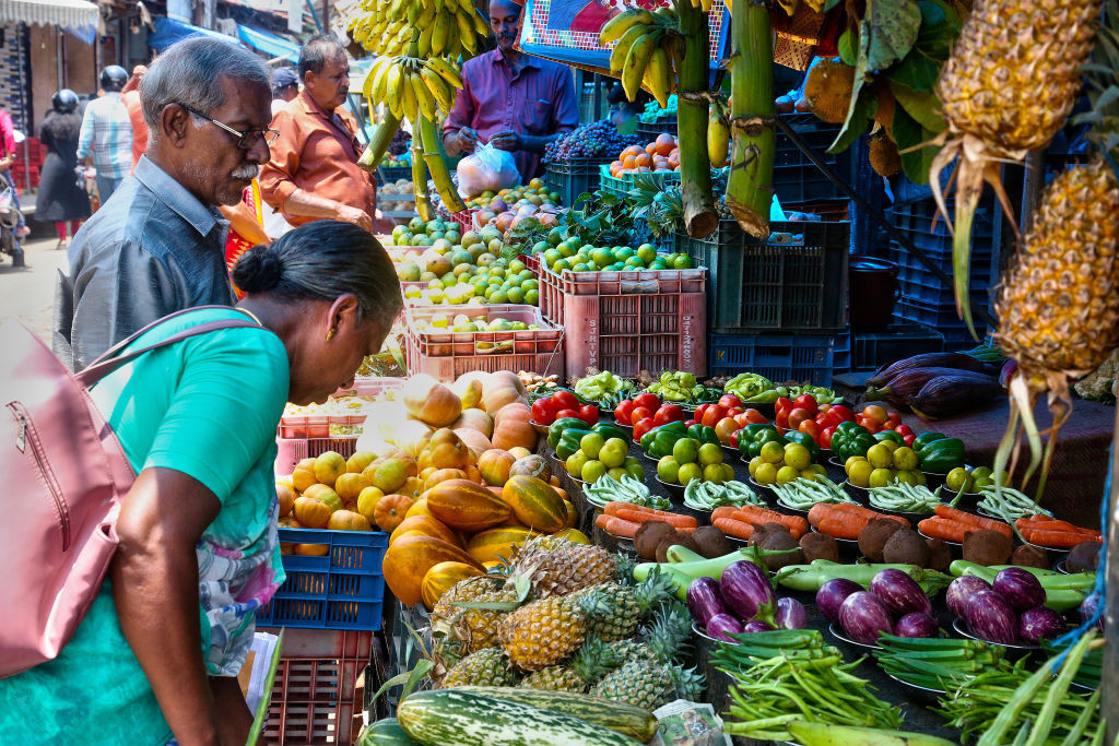 People are purchasing fruits and vegetables at the Chalai market in Thiruvananthapuram, Kerala, India, on April 13, 2024. The Chalai Market (Chalai bazaar) is Kerala's oldest market and is believed to have existed since the 14th Century. (Photo by Creative Touch Imaging Ltd./NurPhoto via Getty Images)