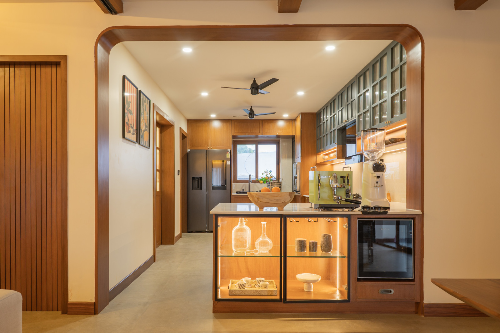 The kitchen in a Chennai, India home designed by Abhinaya Rangarajan of Coexist Architecture