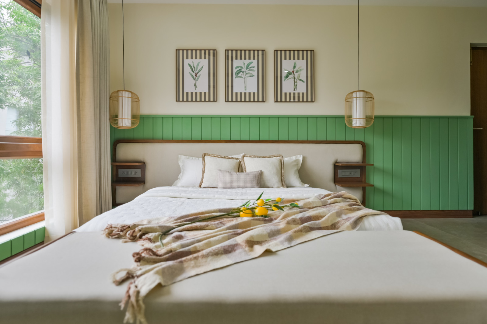 A bedroom in a Chennai, India home designed by Abhinaya Rangarajan of Coexist Architecture