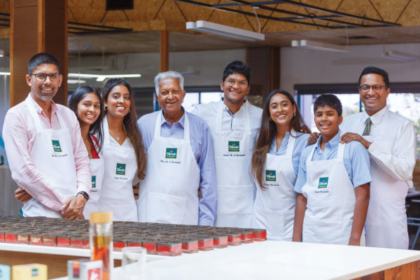 The Dilmah Ceylon Tea Company was founded by Merrill J Fernando (fourth from the left) and his legacy is continued by his sons and grandchildren (Photo: Dilmah Ceylon Tea Company)