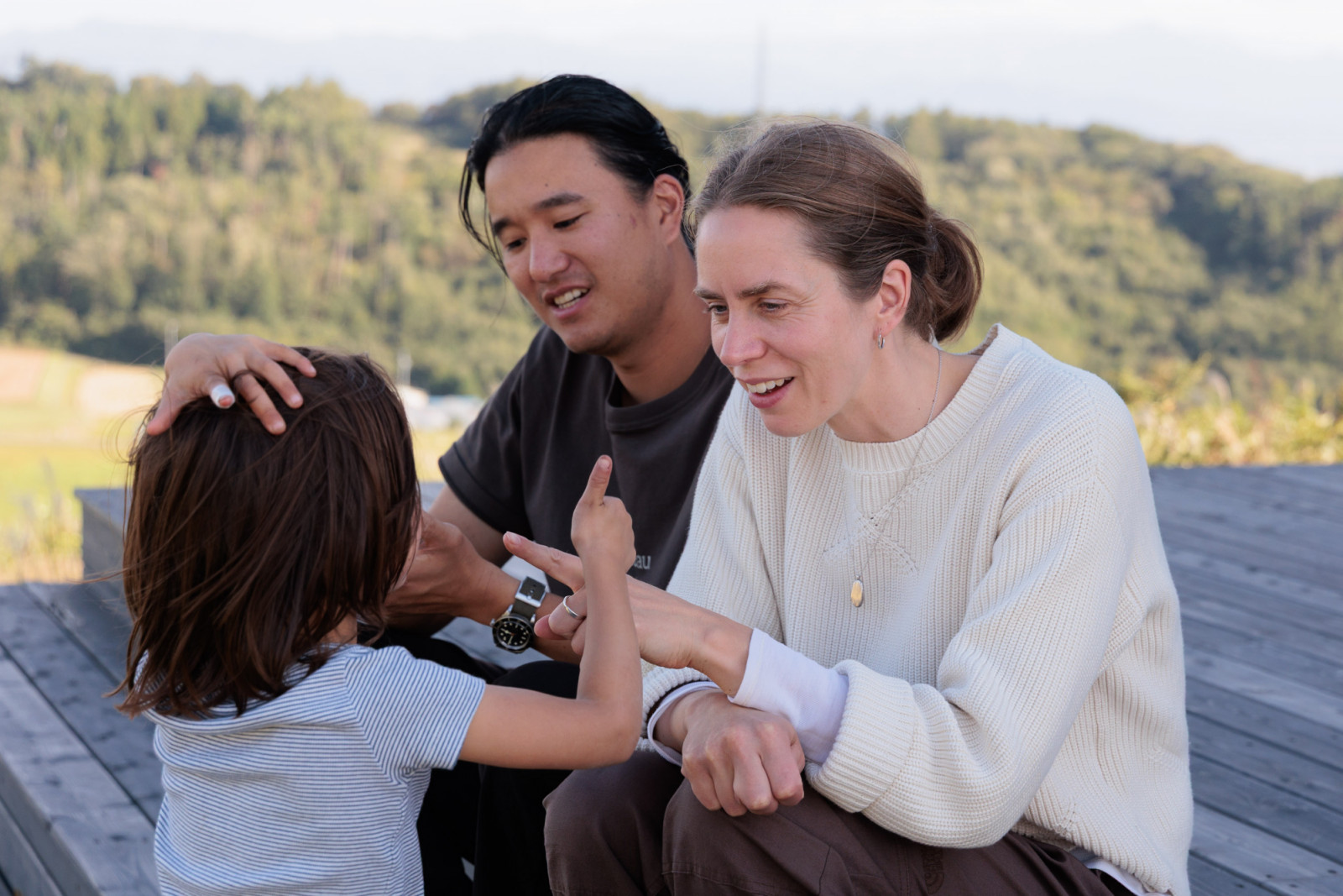 Chef Kyumin Hahn and his wife, Anna Küfner with their four-year-old daughter, Juli at Song restaurant